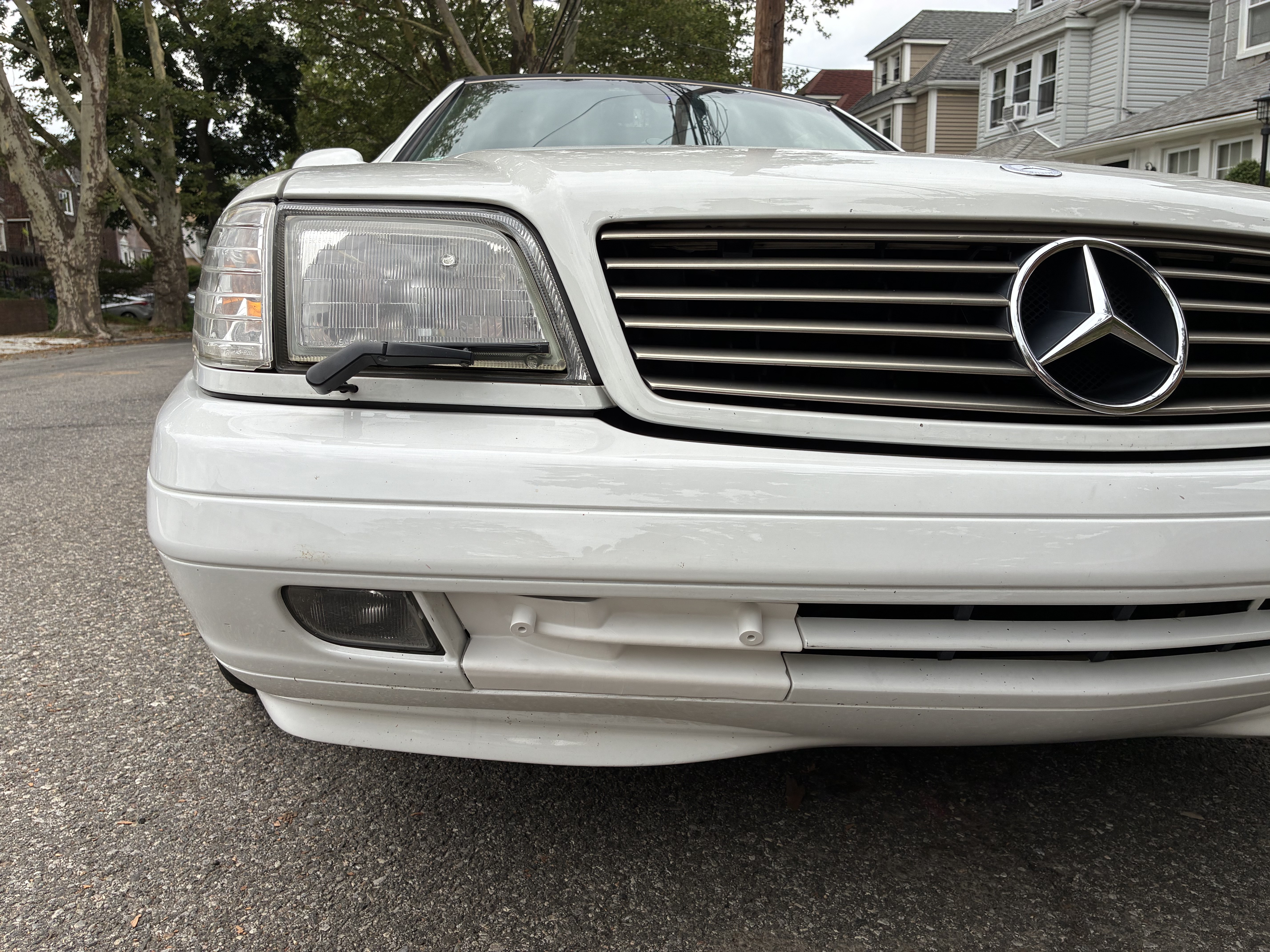 R129 Facelift Front Bumper Tow Hook Cover with License Plate Mount 1298800205 12988002059999 thumbnail