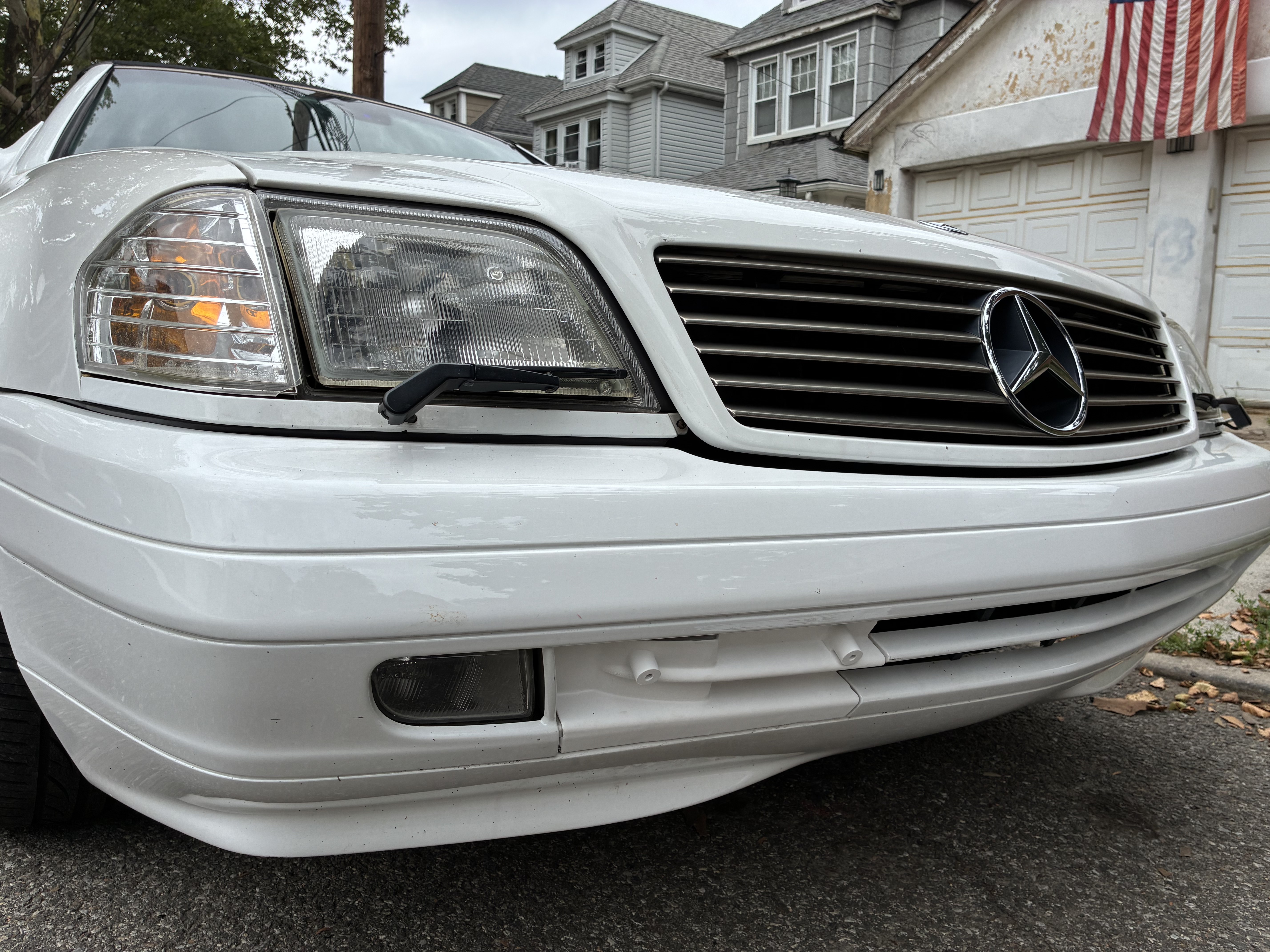 R129 Facelift Front Bumper Tow Hook Cover with License Plate Mount 1298800205 12988002059999 thumbnail