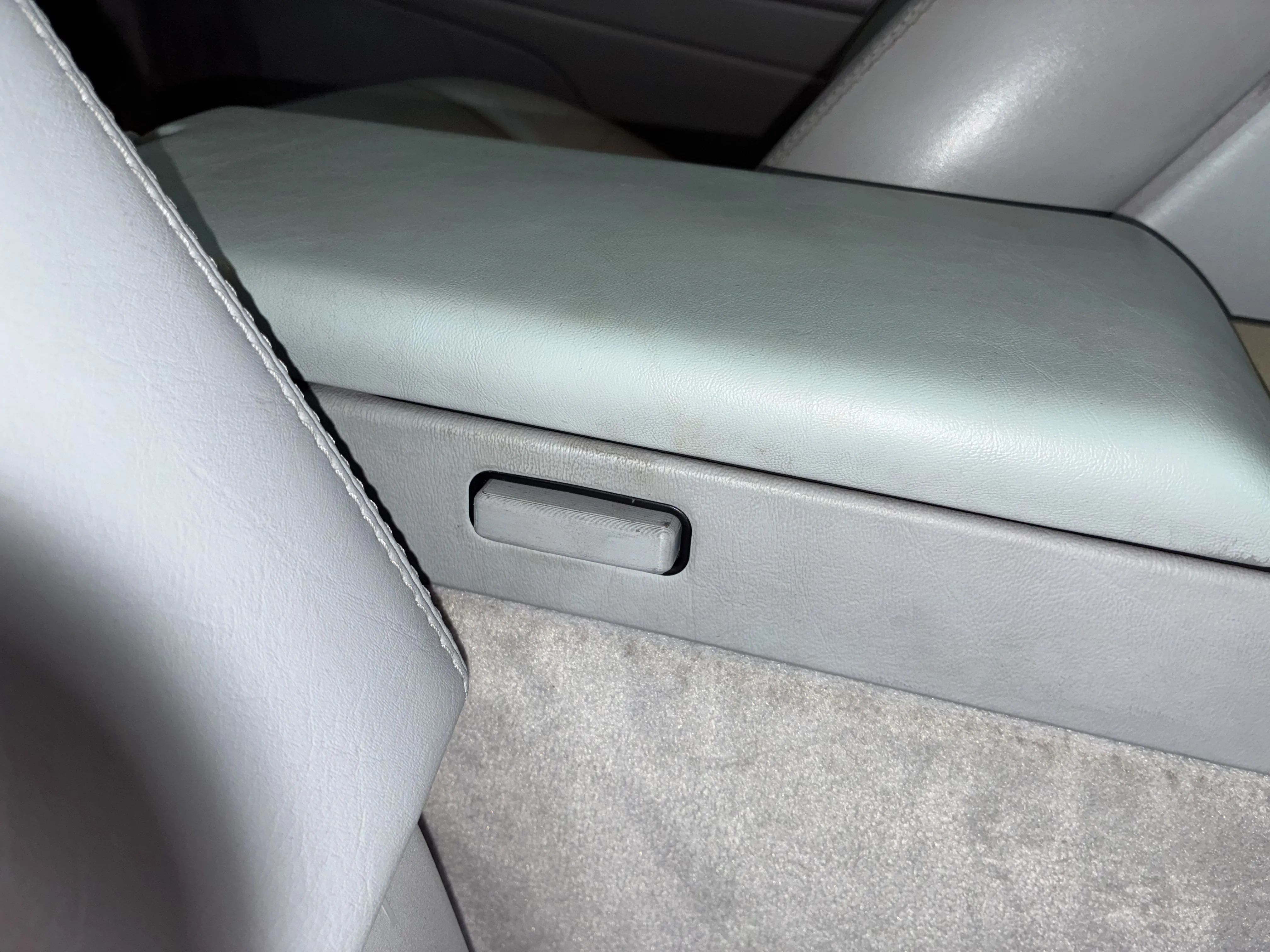 R129 Center Console Armrest Push Buttons, Lid Latch (1296830155) and Side Button (1296830055) thumbnail